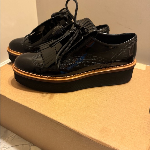 Tod's Glossy Black Leather Fringe Loafers - Picture 2 of 6
